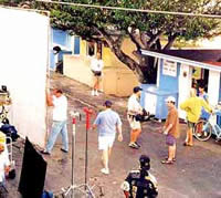 film crew surrounds veggie stand at Harbour Island Bahamas